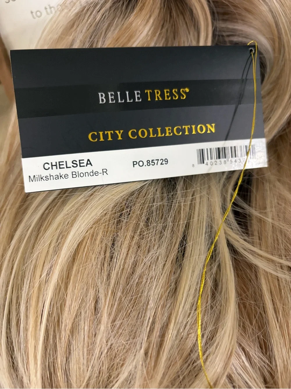 Belle Tress Chelsea in Raw Sugar Blonde. Women's Wig - heat friendly synthetic.